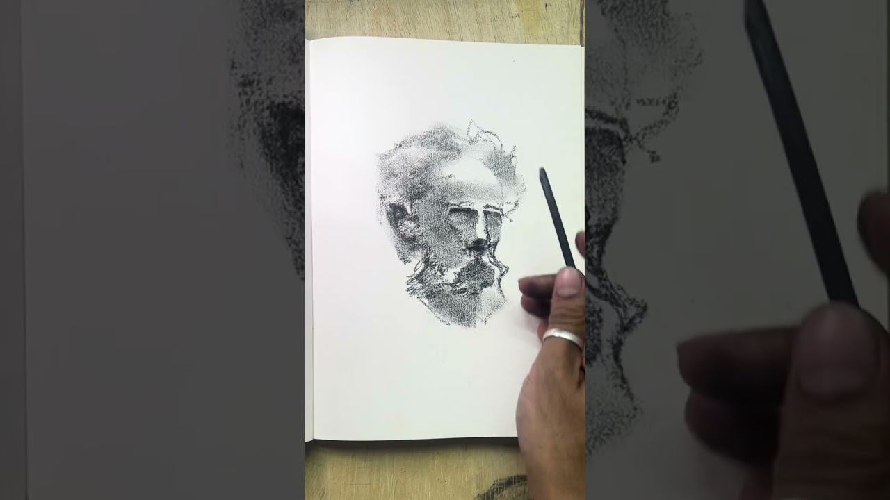 3:09su charcoal portrait demo on my journal—capturing form, flow & raw energy