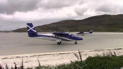 Barra beach airport Twin Otter aeroplanes take off and land 150915
