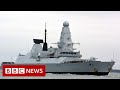 Russia says it fired warning shots at British warship - BBC News