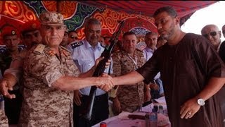 Cientos de libios dicen adiós a las armas