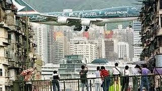 A look at kai tak airport and how airplanes must make breathtaking
approach or take-off over hong kong's kowloon city . this report also
examines ...