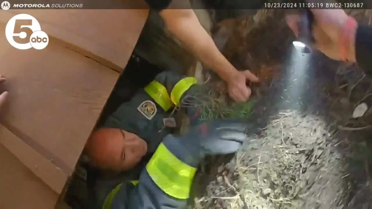 Woman rescued from basement of burning home - YouTube