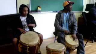 Isani drumming with Dale Aranda