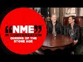 Queens Of The Stone Age on overcoming hard times, a "romance" with Dave Grohl, and what's next