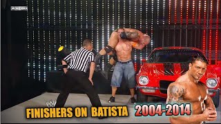 WWE ALL FINISHERS  ON BATISTA 2004 TO 2014 HIGHLIGHTS