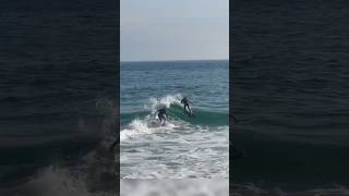 Double Skimboarding On Sider Wave