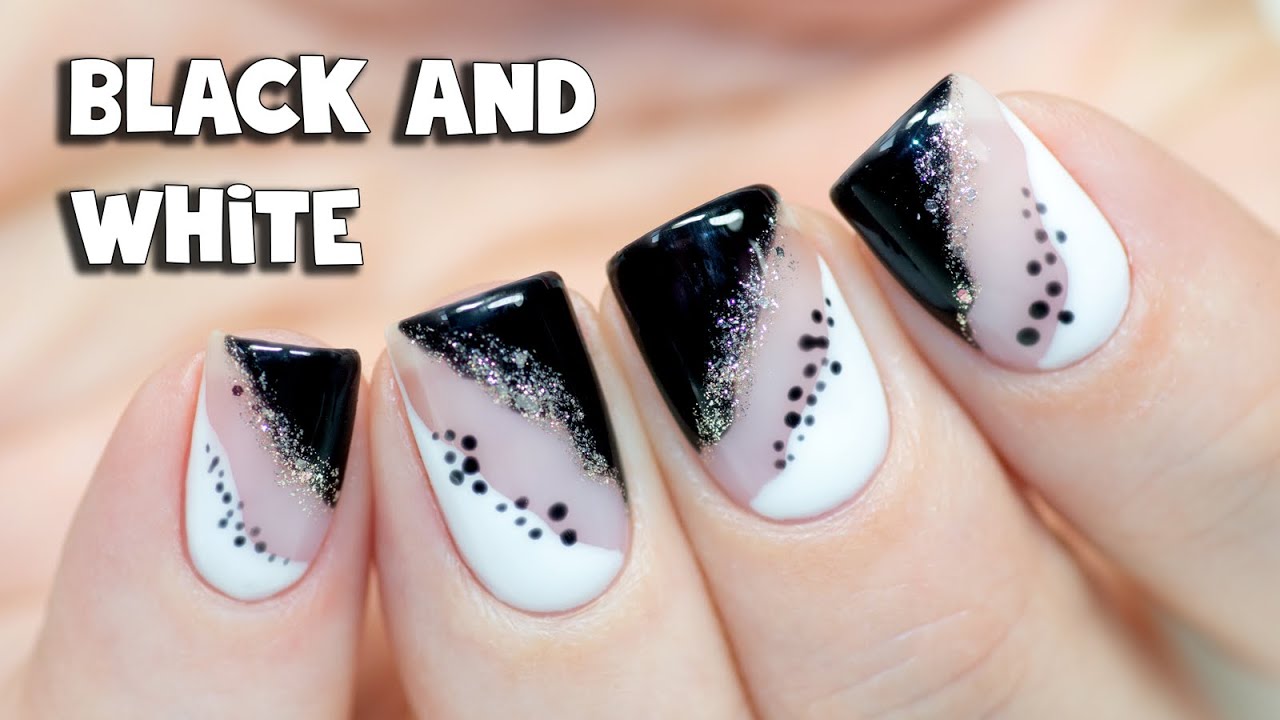 8. Black and White Abstract Nail Art - wide 5