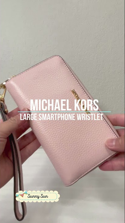 Michael Kors New Jet Set Charm Large Flap Phone Wristlet pink color