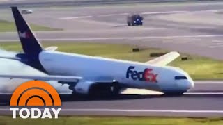 Watch: Sparks fly as FedEx plane lands without front landing gear