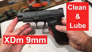 How to Clean a Springfield XDm 9mm semiautomatic pistol. Disassemble, clean, lube and reassemble. screenshot 2