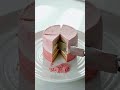 multicolored kinetic sand block being sliced to reveal hidden mini toys
