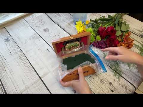 Fresh flowers  in a cigar box. Everything can be a vase!