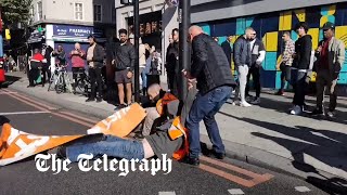 video: Watch: Motorists drag Just Stop Oil protesters off the road