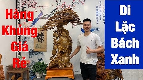 Hàng khủng. Di lặc vác cành đào đứng gốc tùng gỗ bách xanh mộc châu. Lh: 0389889968 (zalo)