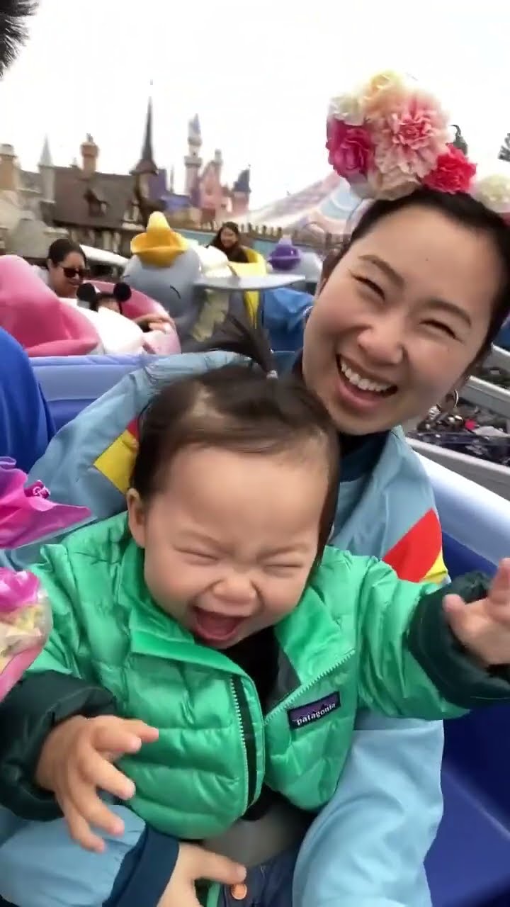 Baby rides roller coaster for first time
