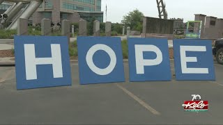 Grieving yet hopeful suicide prevention walk at downtown Sioux Falls
