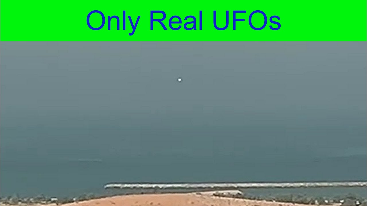 UFO peacefully moving over the island. Abu Dhabi, UAE.