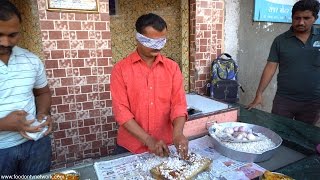 Man Cuts Onion Faster Than a Blender with Blindfold On