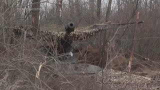 Ukrainian artillery unit fires Howitzers at Russian infantry positions in Bakhmut area