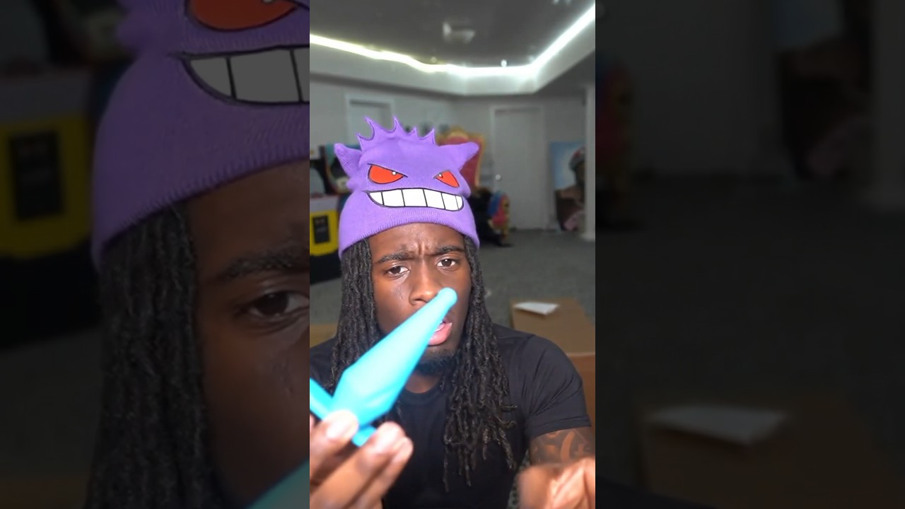 Kai plays with a butt plug 