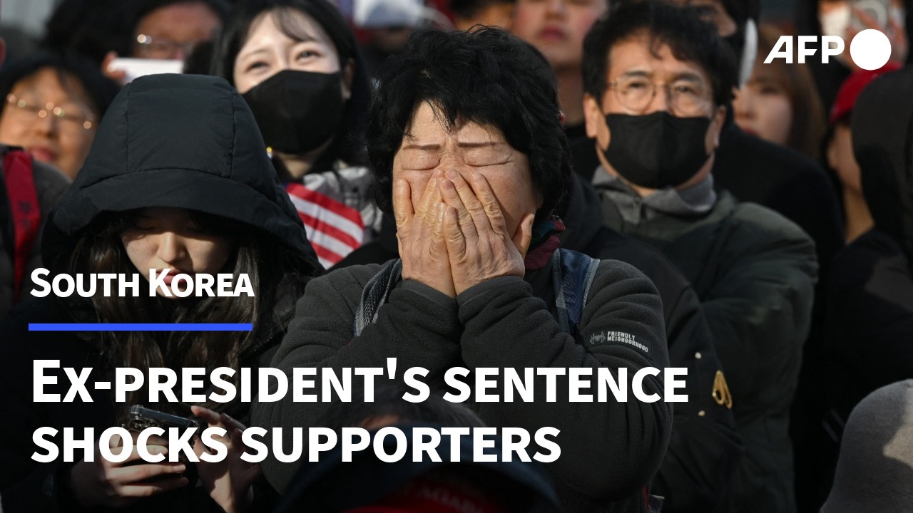Yoon's supporters cry as S.Korean ex-leader gets life in prison for insurrection | AFP
