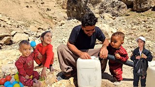 Providing drinking water from the spring / Documentary on the hard life of nomads