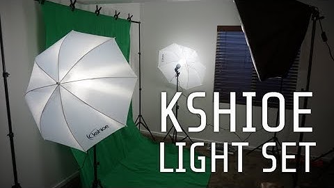 Review of Kshioe photography lighting set with umbrellas, softboxes, and backdrops