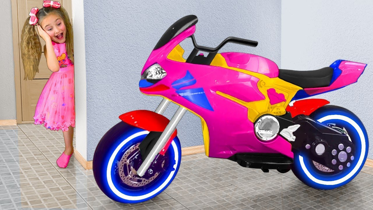 Sasha Rides on Toy Sportbike with Surprise Eggs & play with Toys