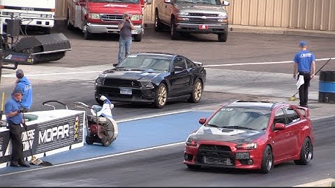 Mitsubishi EVO X vs Ford Mustang GT