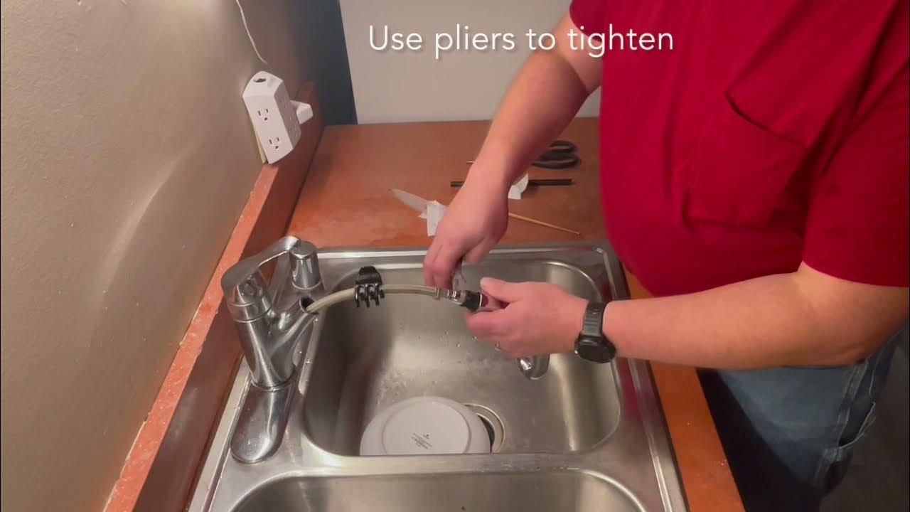 changing kitchen sink sprayer head