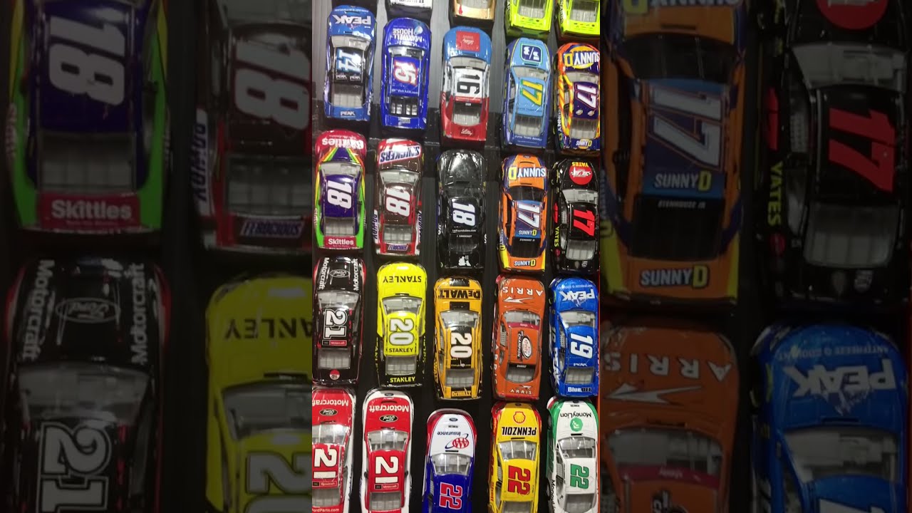 100+ NASCAR Diecast car collection organized by race car number.  Hot Wheels track.