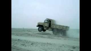 5-ton dump truck jumping off sand dune
