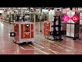 Автоматические LGV погрузчики паллет на заводе Coca-Cola