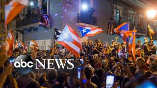 Puerto Rico celebrates and a heat wave grips Europe: World in Photos, July 25