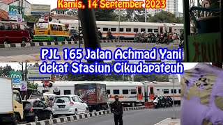 2 KA Lokal Bandung Raya Melewati PJL 165 Jalan Achmad Yani dekat Stasiun Cikudapateuh