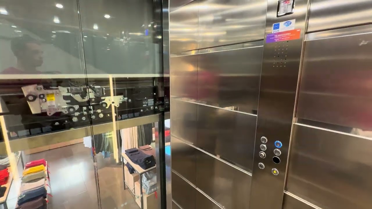 2015 Jam (repl. 2026 TKE) roped hydraulic elevator @ United Colours of Benetton, Trento, Italy