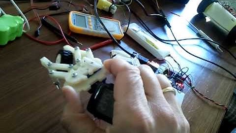 Cc1110, chronos controlling a robot arm. Using arduino to control servo.