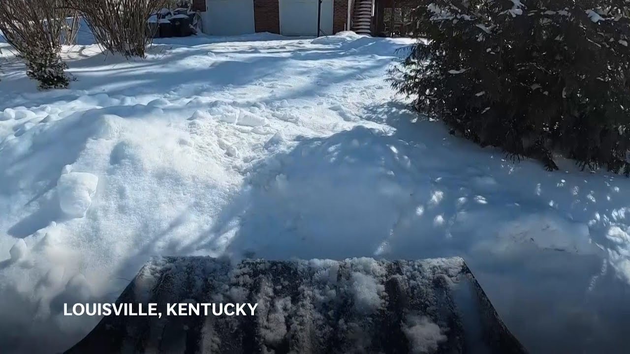 Residents dig out after heavy snow in Kentucky - YouTube