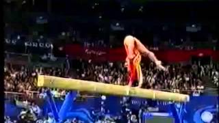 Balance Beam Press to Handstand Release One Hand 180 Swing Down Gymnastics Video