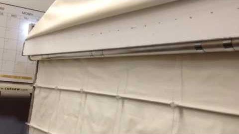 Back side of motorized Roman shade