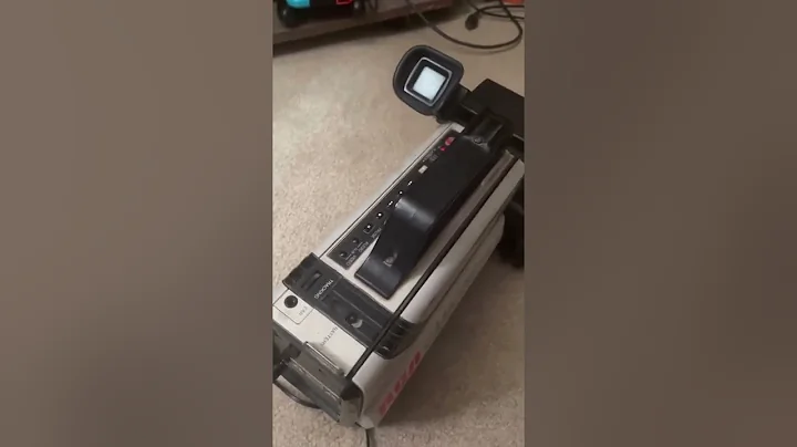 RCA CC310 VHS camcorder with universal power adapter