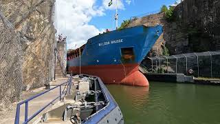 Trollhättan Sweden boat comes boat leaves from Slussen on a nice day 4k