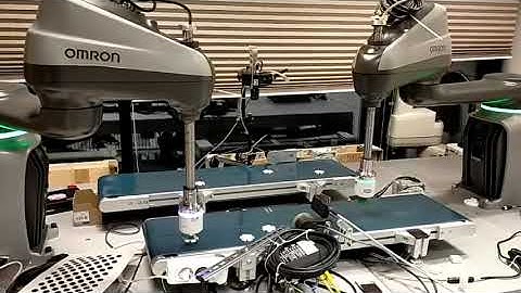 Pick and place application using vision and encoder latches with two omron i4H robots part 2