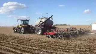 Caterpillar Challenger MT865C with Case IH 16 row Strip Till Unit