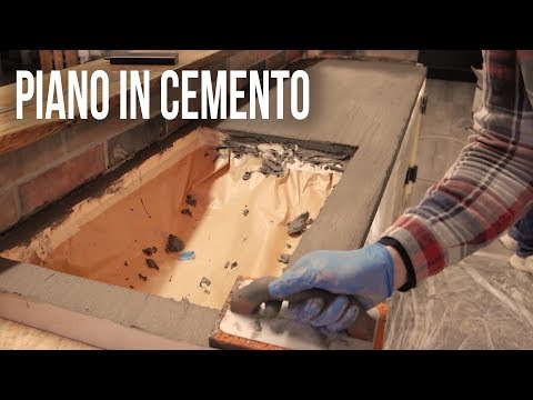 Video: Come si sigilla il piano di un tavolo in cemento?