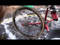 Cleaning the rear wheel after the tour of flanders