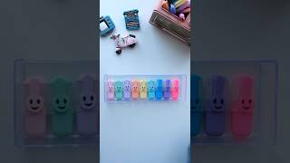 Organizing Tiny Smiley Face Marker Pens