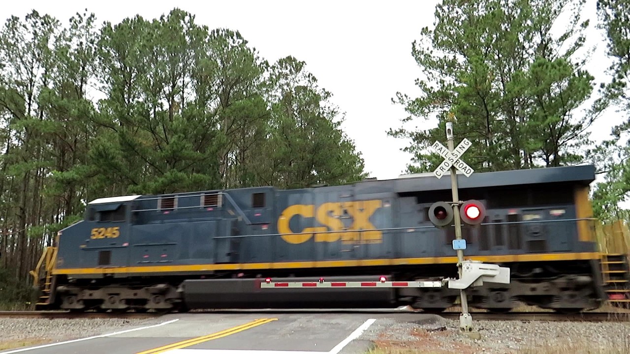 Beating A Fast Freight Train To The Another Crossing