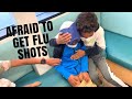 BIG BROTHER CONSOLES LITTLE BROTHER AFTER GETTING A FLU SHOT