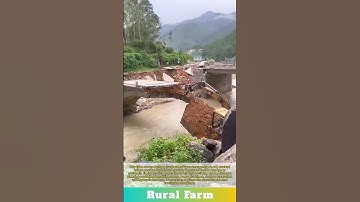 Riverbank collapse emergency: old cracked bridge demolition